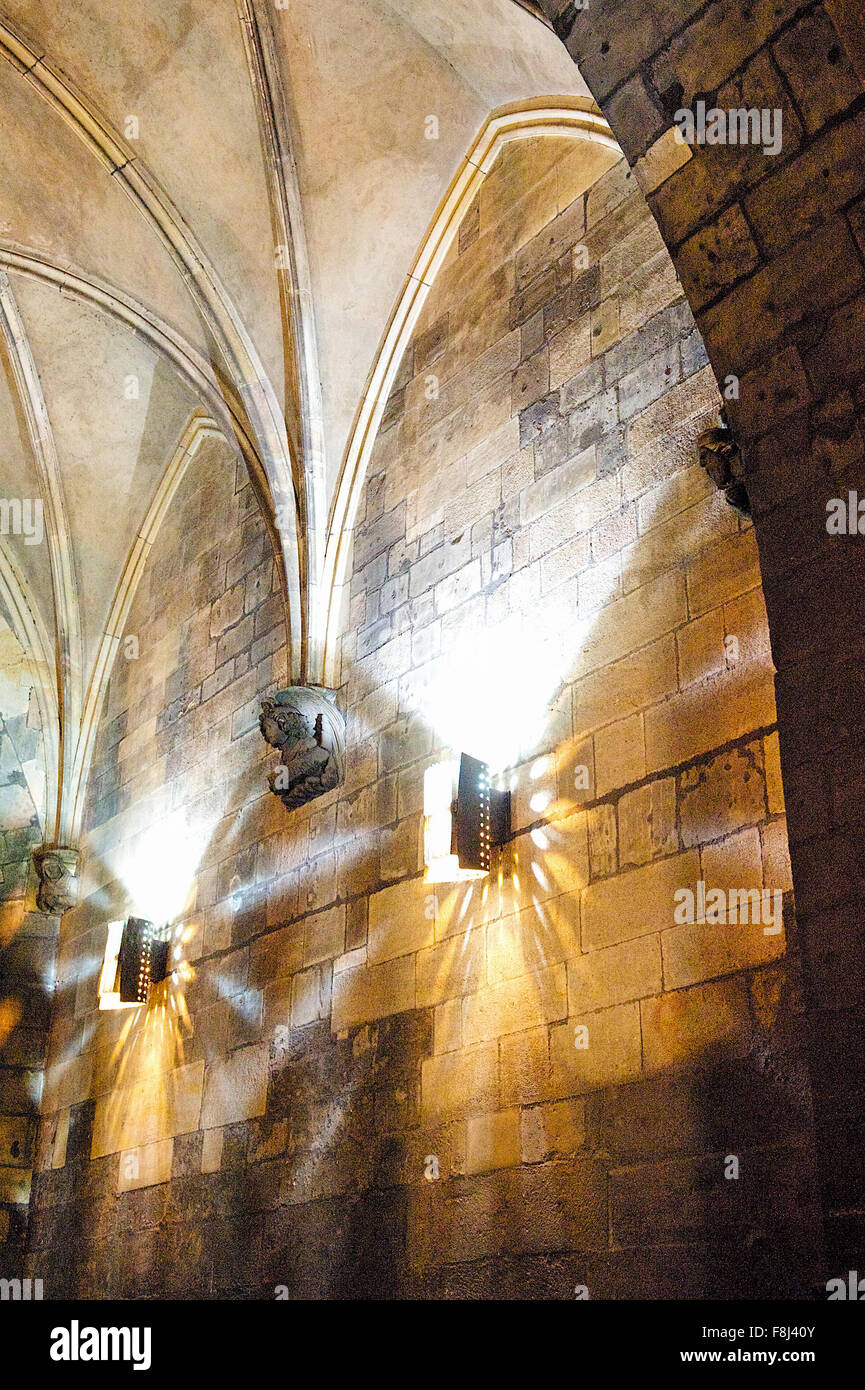 Lights inside the stunning ornate, arch leading through a passage way in Prague City, Czech Republic. Stock Photo
