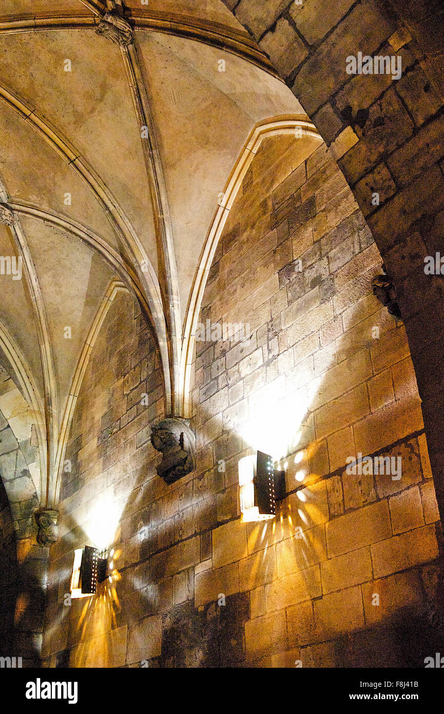 Lights inside the stunning ornate, arch leading through a passage way in Prague City, Czech Republic. Stock Photo