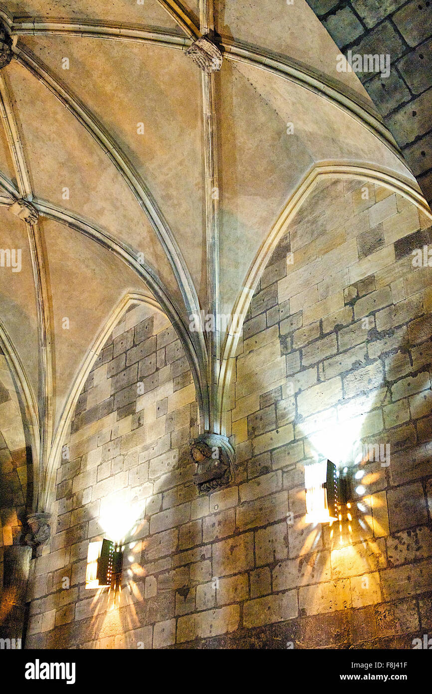 Lights inside the stunning ornate, arch leading through a passage way in Prague City, Czech Republic. Stock Photo