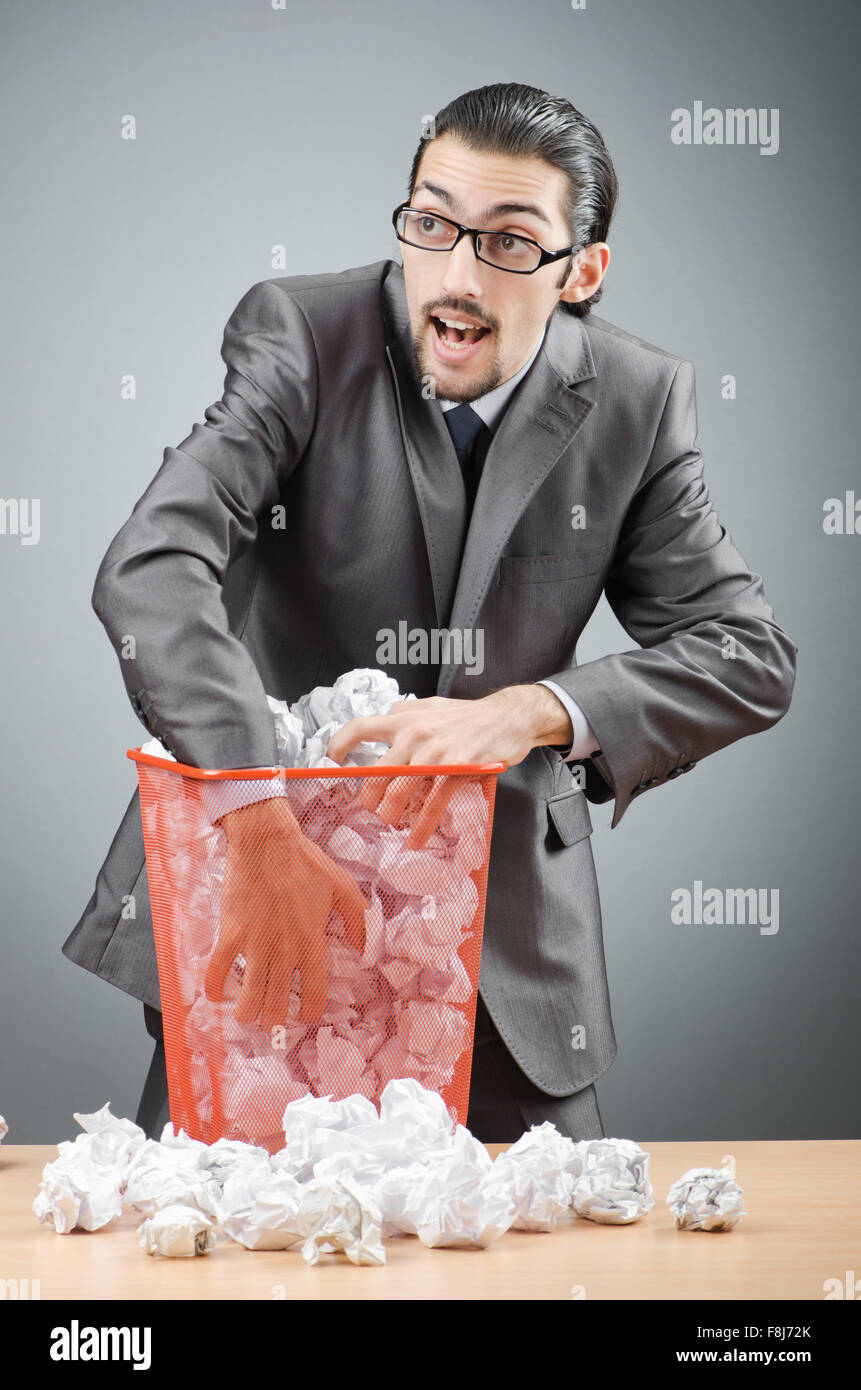 Man at desk lots of paperwork hi-res stock photography and images - Alamy