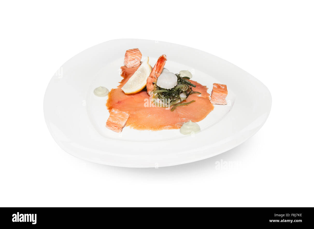 Smoked Salmon and King Prawn Appetizer plate isolated over white