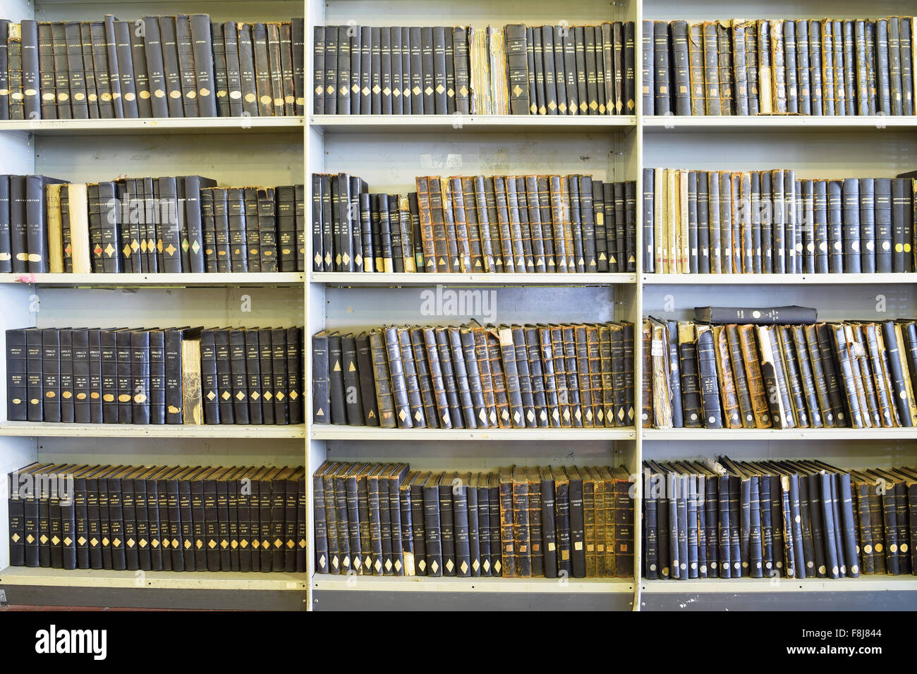Library or bookshelf with old antique books Stock Photo Alamy
