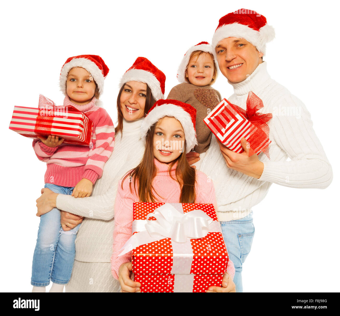 Happy family with 3kids hold New Year presents Stock Photo