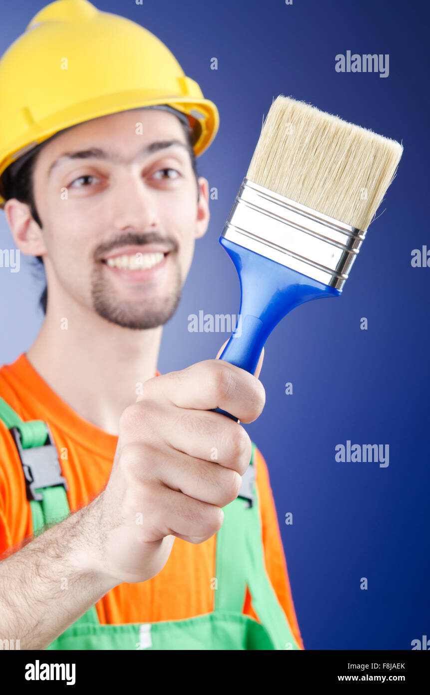 Painter in the studio shooting Stock Photo Alamy
