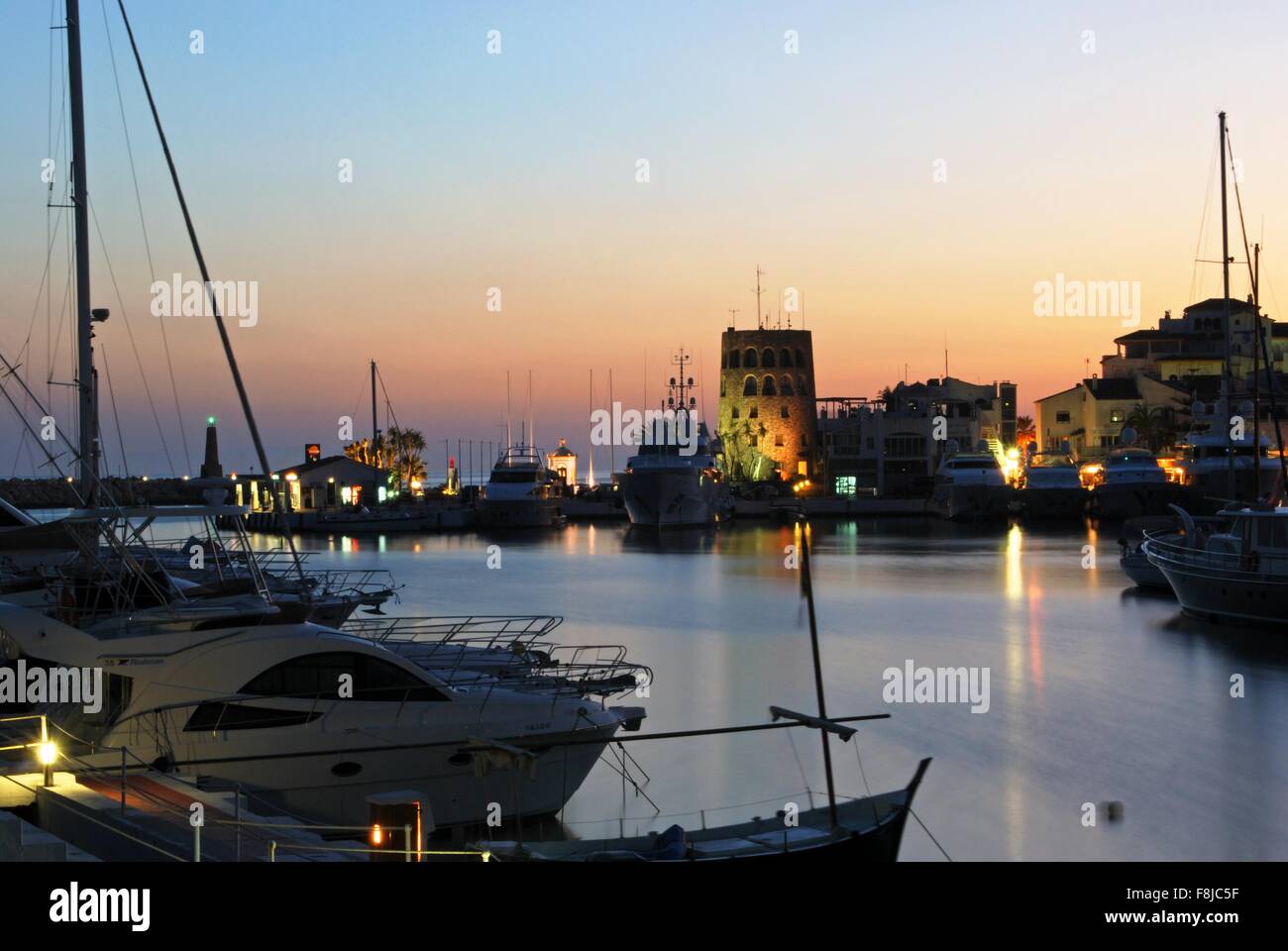 Yachts at Puerto Banus at night with nightlife and parties on boats,  Marbella, Andalusia, Spain Stock Photo - Alamy