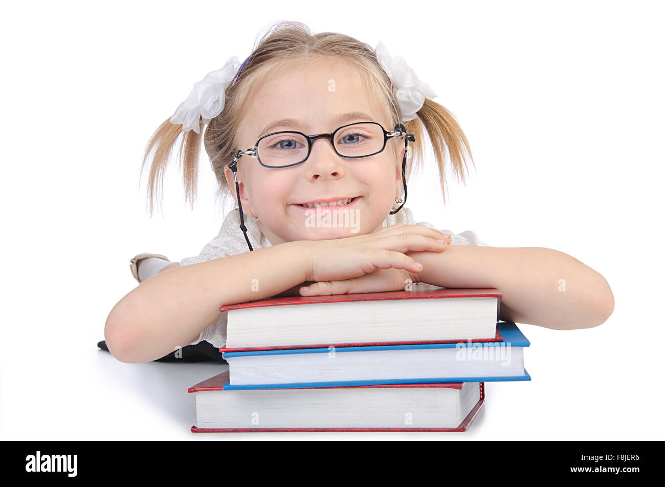 Little girl with books on white Stock Photo - Alamy
