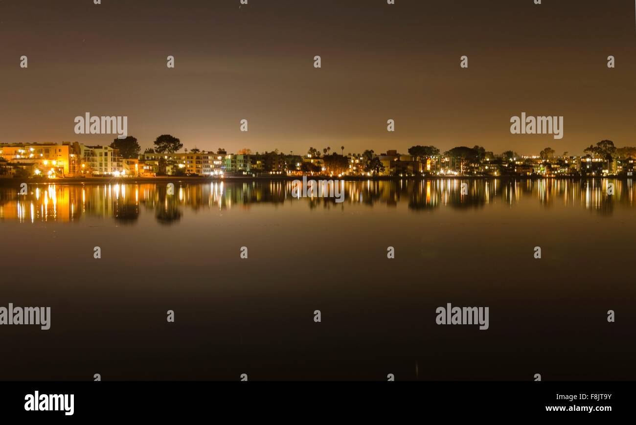 A night view of the skyline over Sail bay in Mission Bay over the Pacific beach in San Diego, California in the United States of Stock Photo