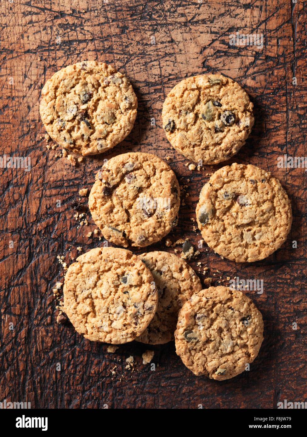 Overhead view of chocolate chip, fruit, nut and seed cookies on