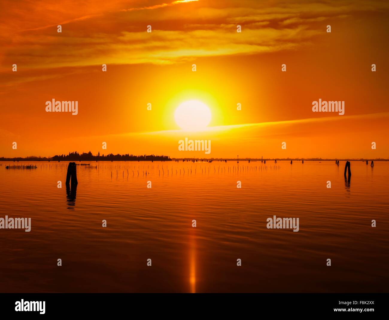 Golden sunset over Venetian Lagoon, Italy Stock Photo