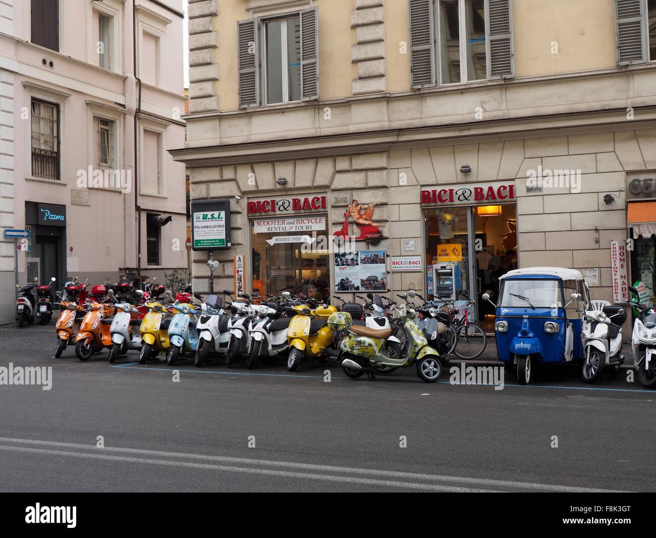 Bici & Baci scooter rental company in the city center of Rome, Italy Stock Photo