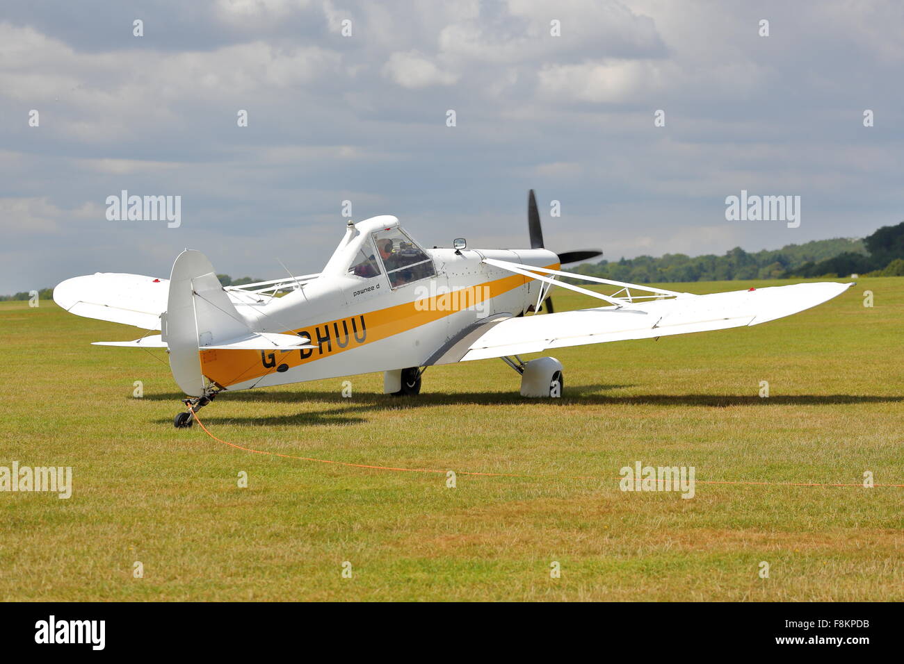 Piper Pawnee PA-25 D G-BHUU tug in action at Booker Airfield, Wycombe Airpark Stock Photo