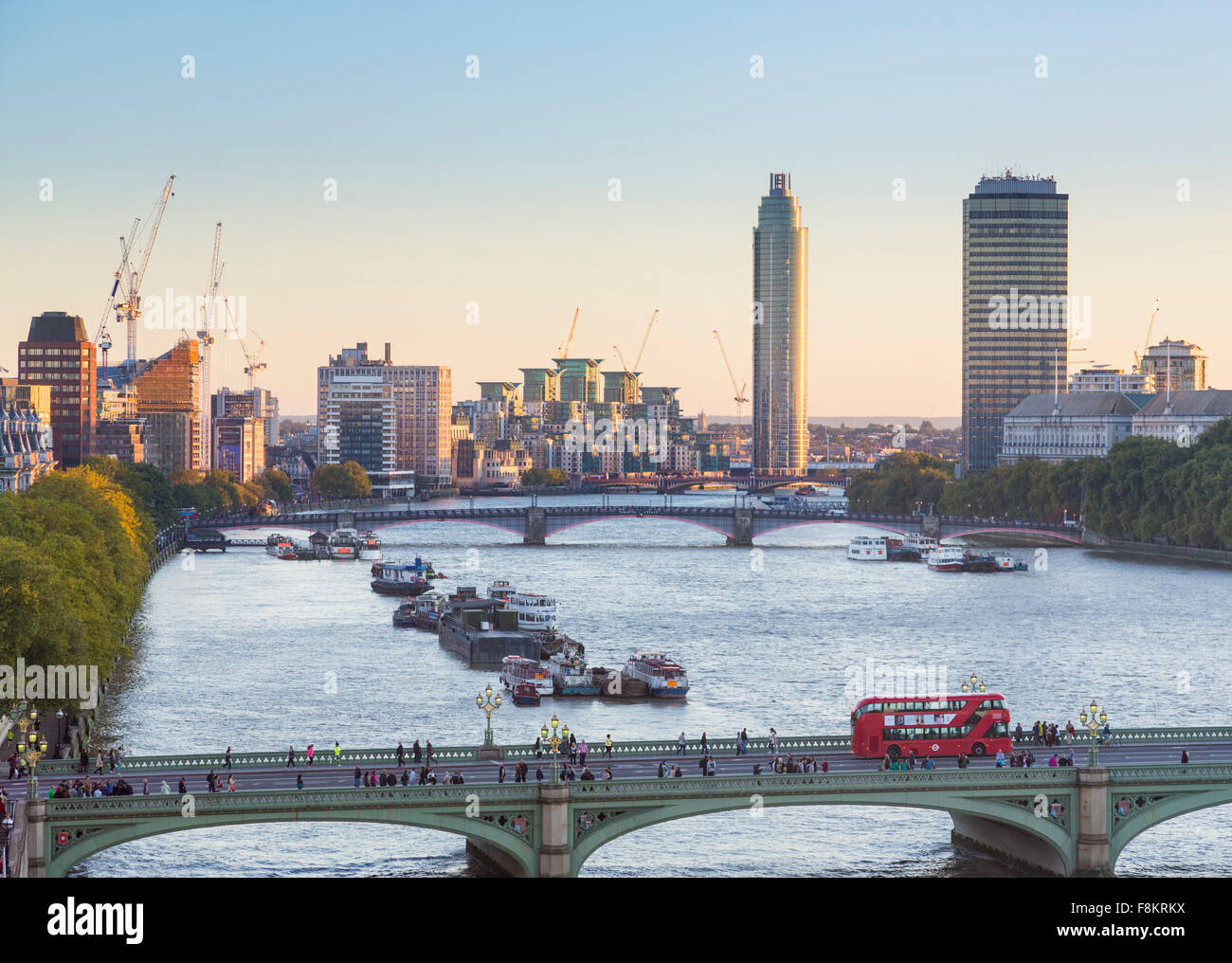 View of River Thames with Nine Elms redevelopment and St George Wharf on South Bank, London, England in late afternoon light Stock Photo