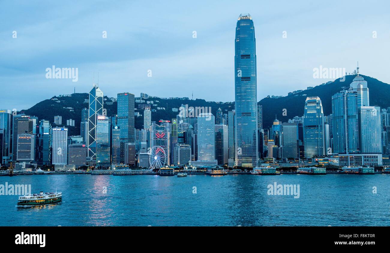 Ferry crossing Victoria harbour at dusk, Hong Kong, China Stock Photo ...