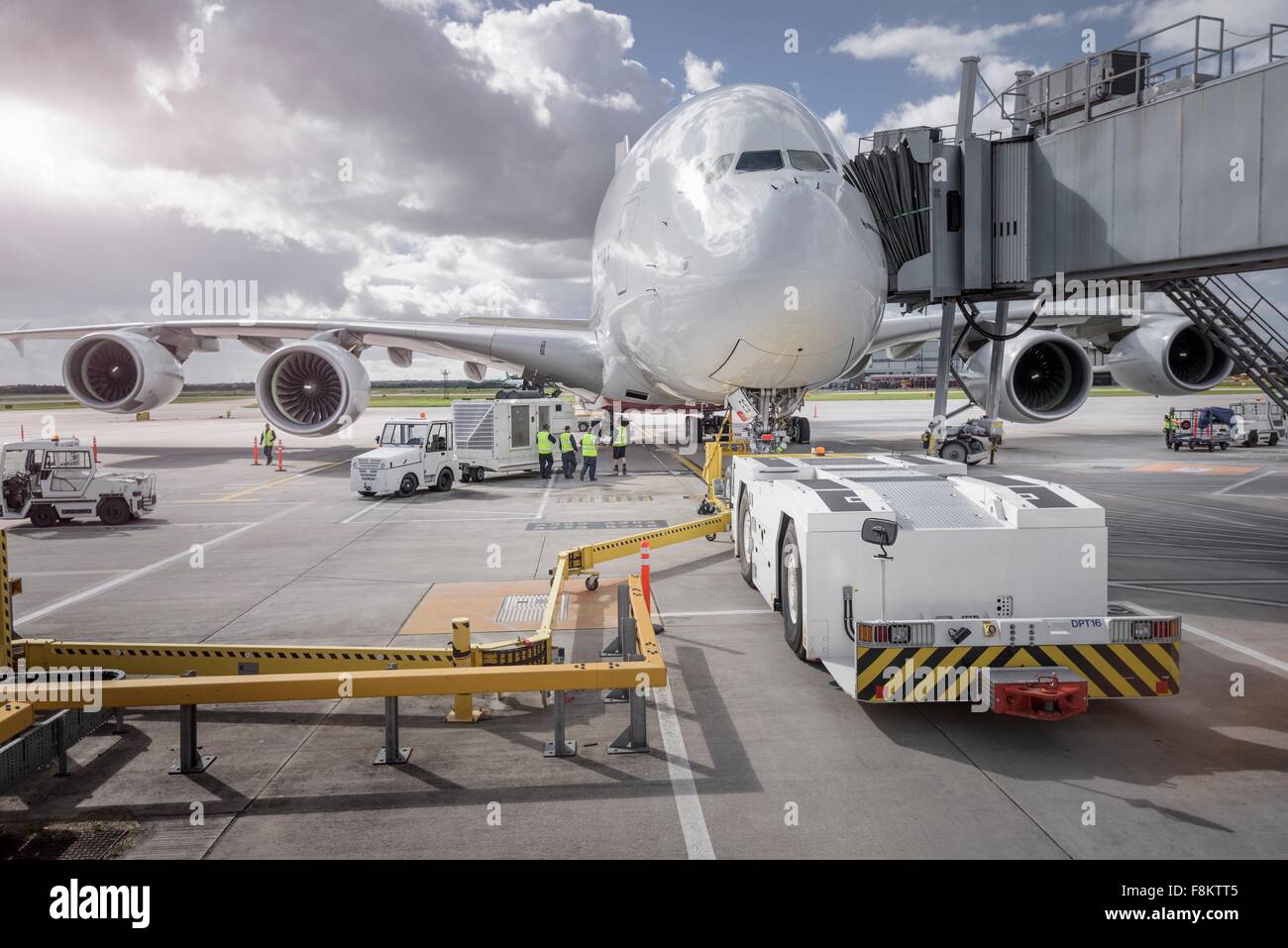 Ground crew operating loading equipment on A380 aircraft Stock Photo ...