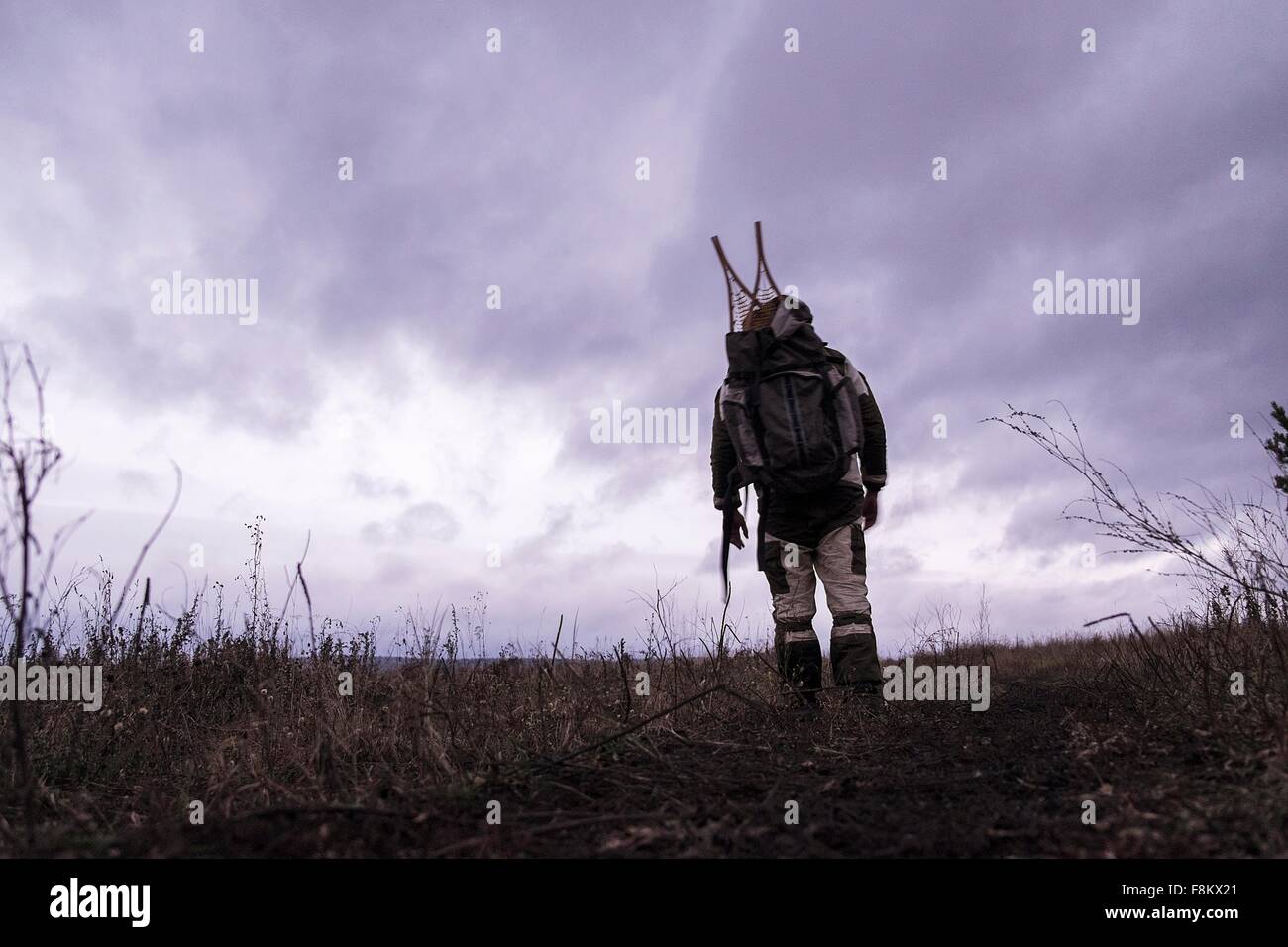 Rear View Of Male Hiker Hiking In Empty Landscape Ural Russia Stock   Rear View Of Male Hiker Hiking In Empty Landscape Ural Russia F8KX21 