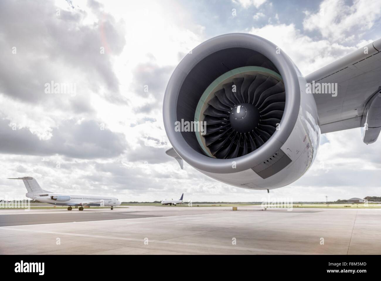View of A380 aircraft jet engine and planes on runway Stock Photo