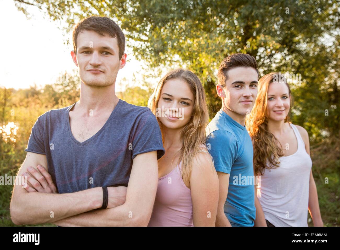 Portrait of group of friends in rural environment, smiling Stock Photo
