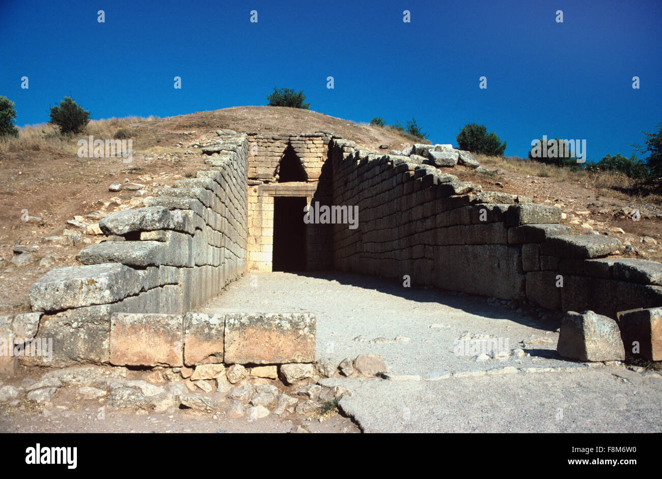 Entrance to the Tholos Tomb of Agamemnon or the Treasury of Atreus (1250BC) on the Panagitsa Hill at Mycenae Greece Stock Photo