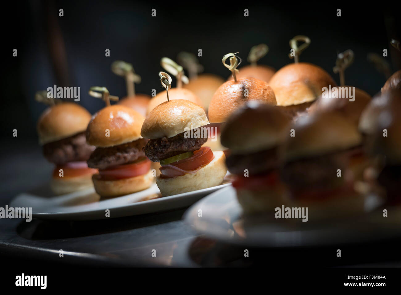 Burgers on a serving tray in a restaurant Stock Photo