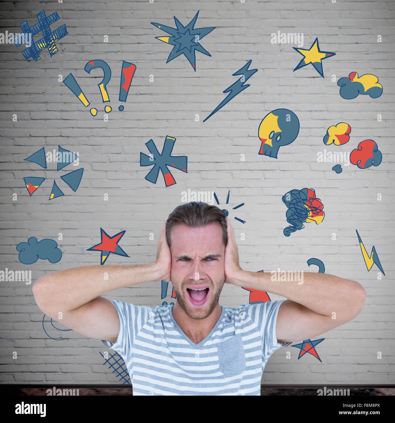 Composite image of handsome man screaming while covering ears Stock Photo