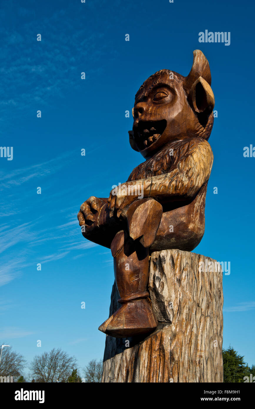 A carved wooden statue of the Lincoln Imp,by local artist Mick Burns in 2014. Stock Photo