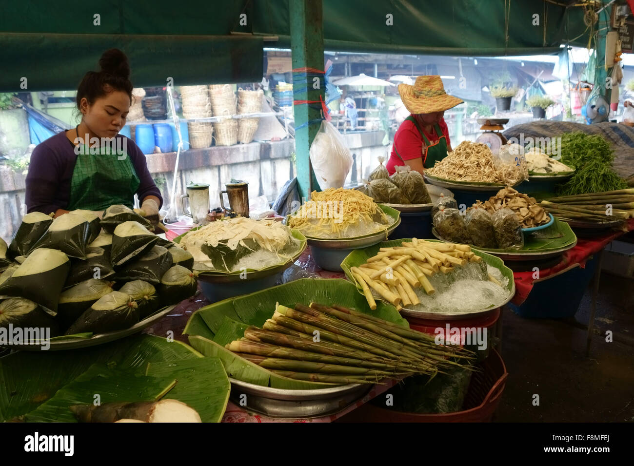 Neatly prepared and displayed vegetable produce in a covered Thai food market in Bangkok Stock Photo
