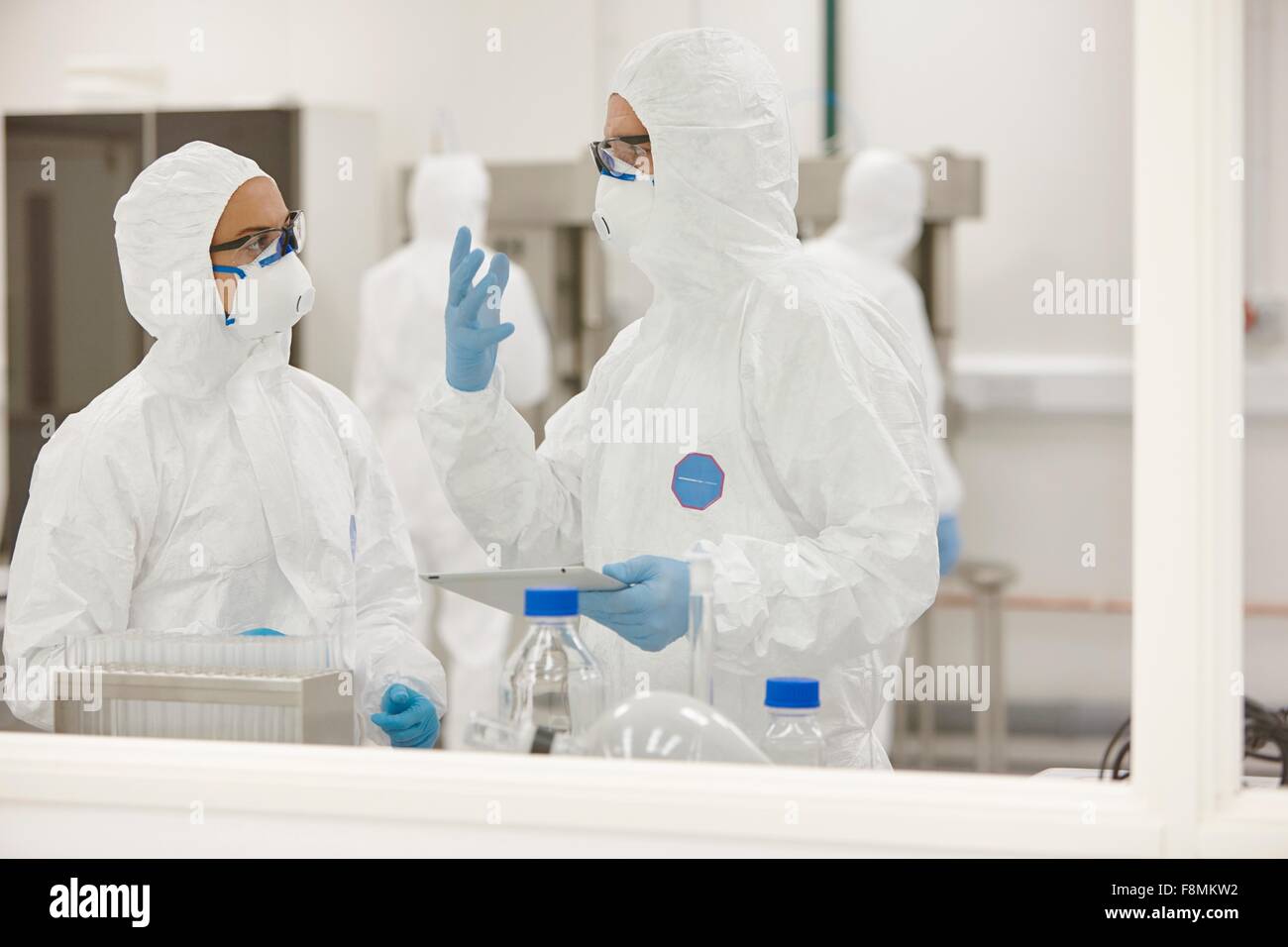 Scientists working in laboratory Stock Photo