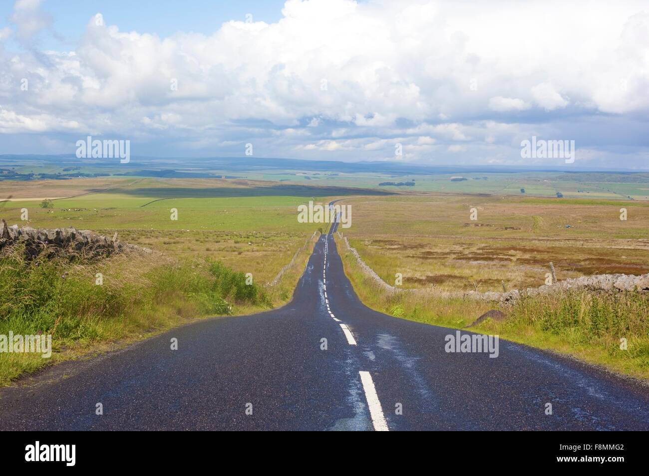 Diminishing perspective of rural road, Cumbria, UK Stock Photo