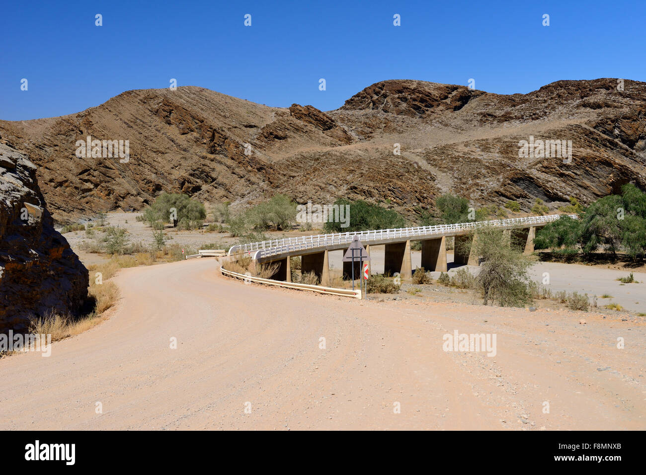 Kuiseb Pass bridge over dry river bed on Route C14 north of Solitaire, Namibia Stock Photo