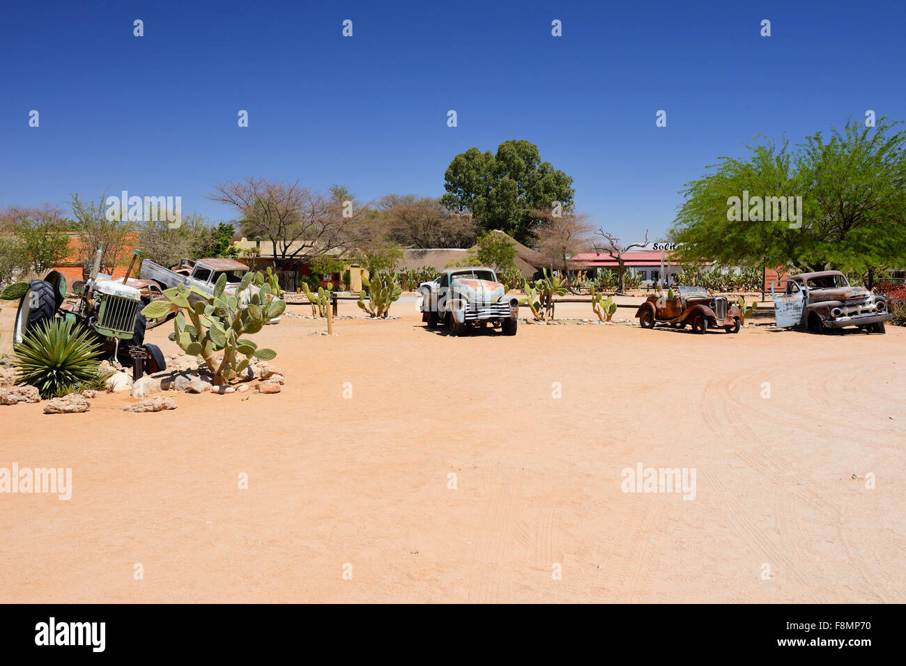 Abandoned vehicles at entrance to desert town of Solitaire, Namibia Stock Photo