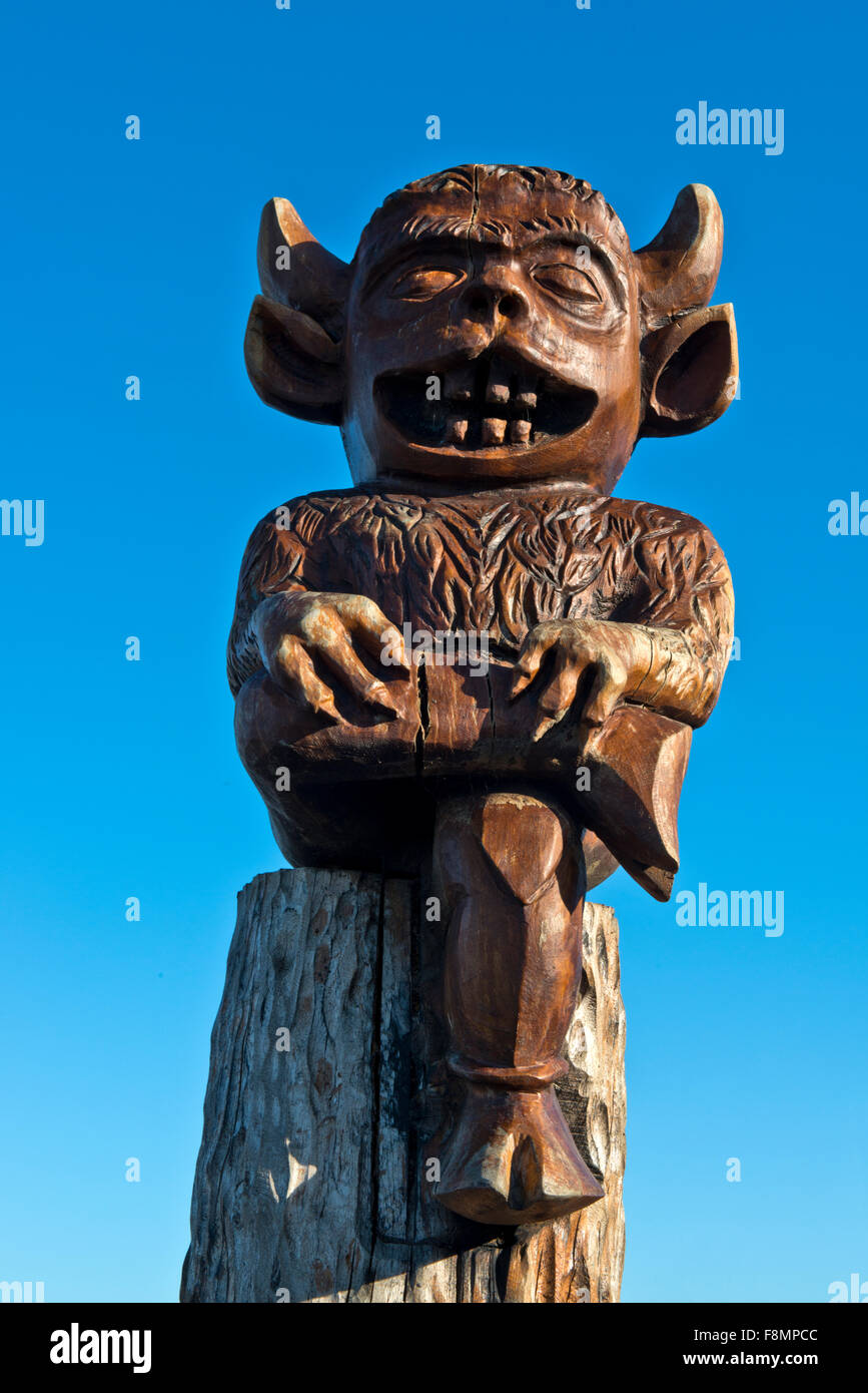 A carved wooden statue of the Lincoln Imp,by local artist Mick Burns in 2014. Stock Photo
