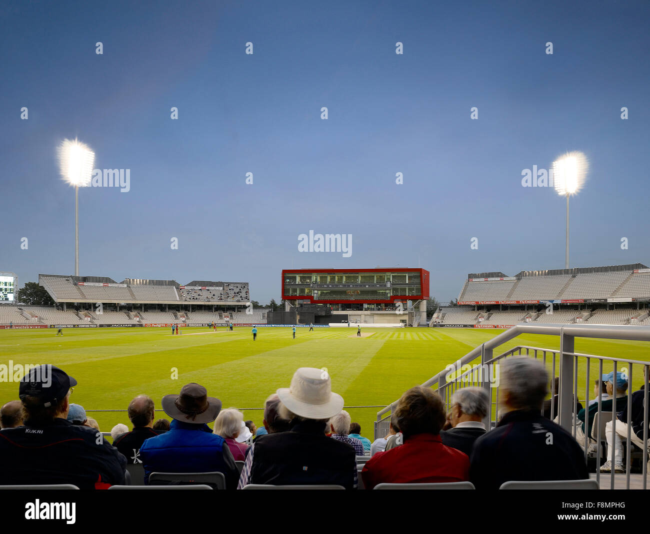 Lancashire County Cricket Club, Manchester. An evening match in progress under floodlights at Lancashire County Cricket Club. Stock Photo