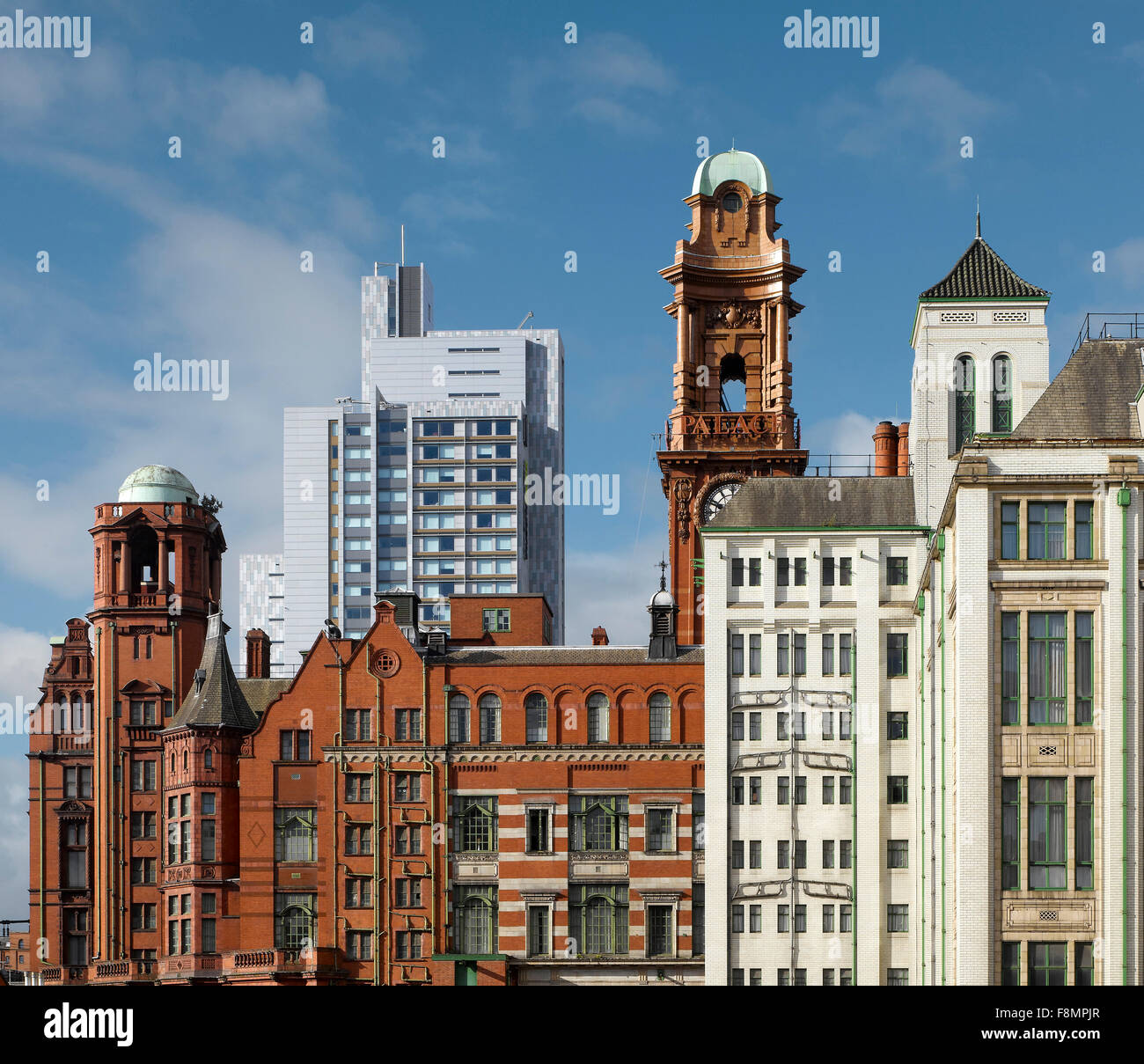 Contrast of architectural styles, old and new buildings in Manchester includes modern tower of student accommodation Stock Photo