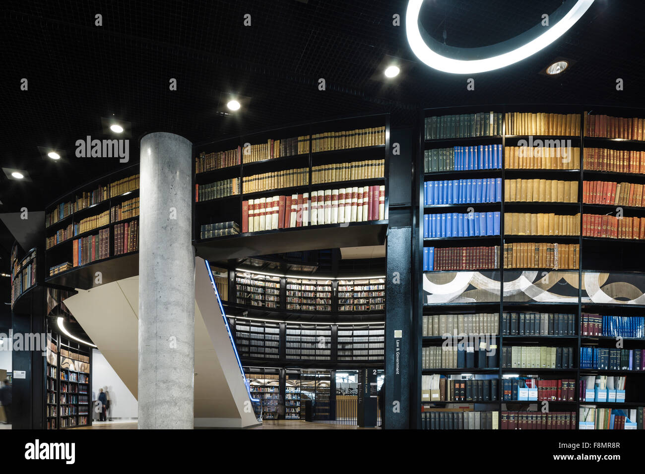 Birmingham Library. Interior view of public library. Curved walls with lined with bookshelves. Contemporary architecture and interior design. Stock Photo