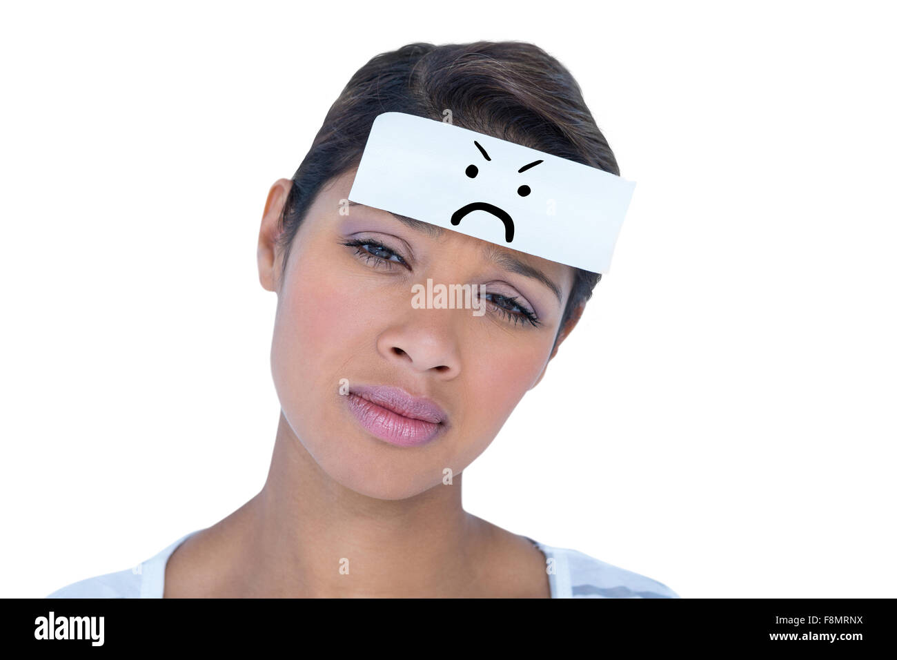 Composite image of portrait of upset woman with blank note on forehead Stock Photo