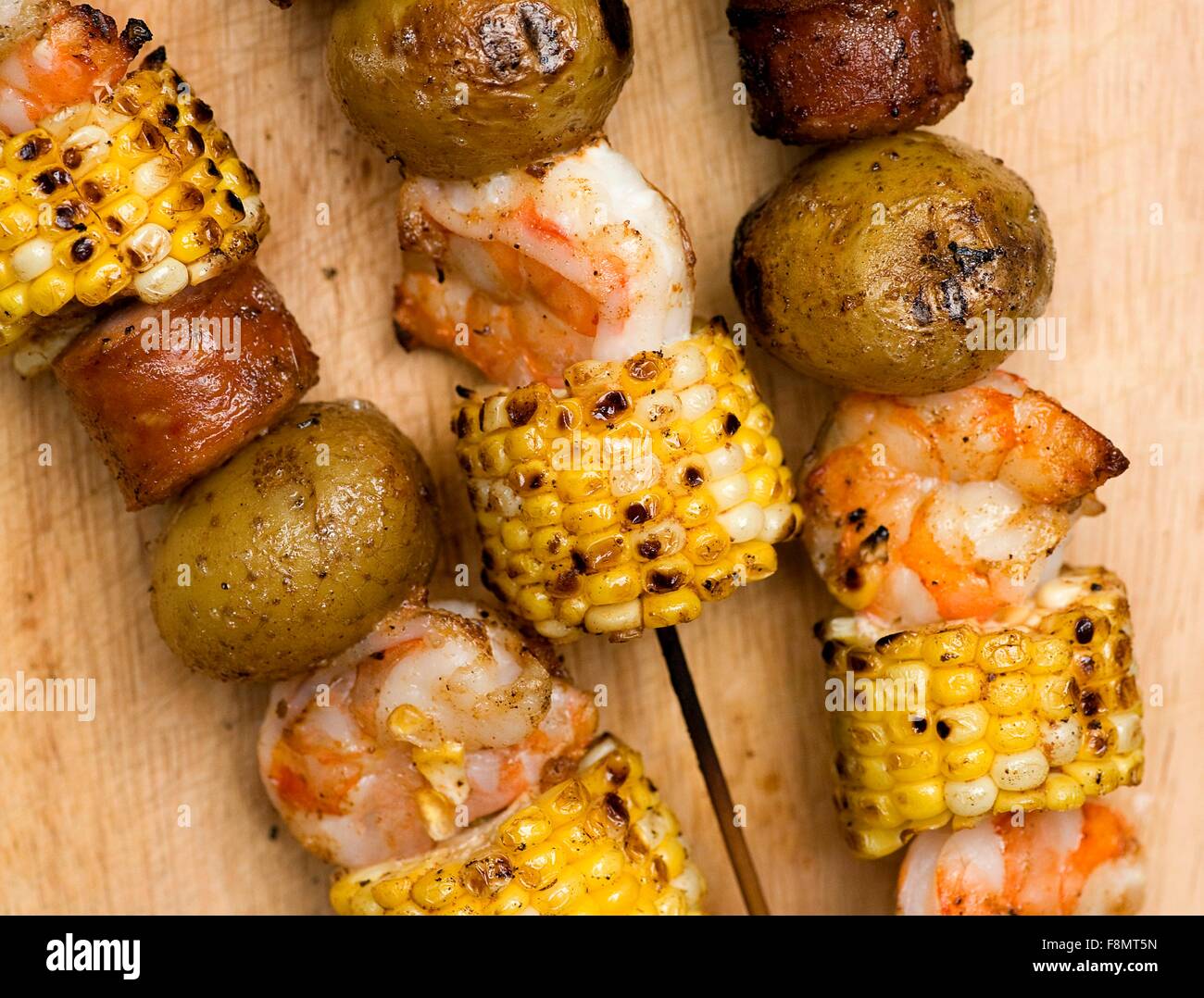 Shrimp, Corn, Sausage and Potato Kabobs Stock Photo Alamy