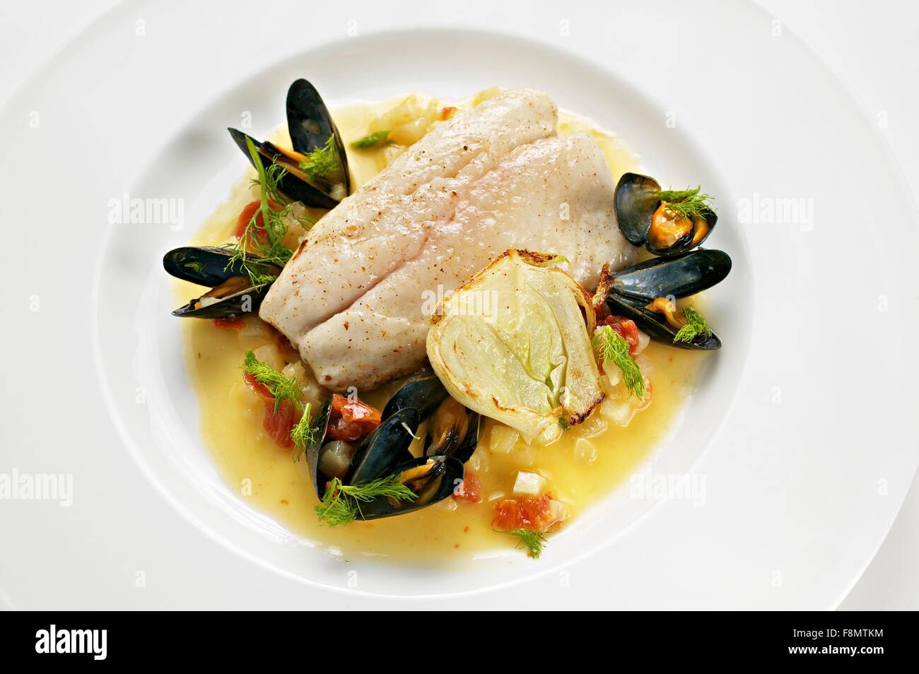 Bass fillet with mussels and fennel Stock Photo Alamy