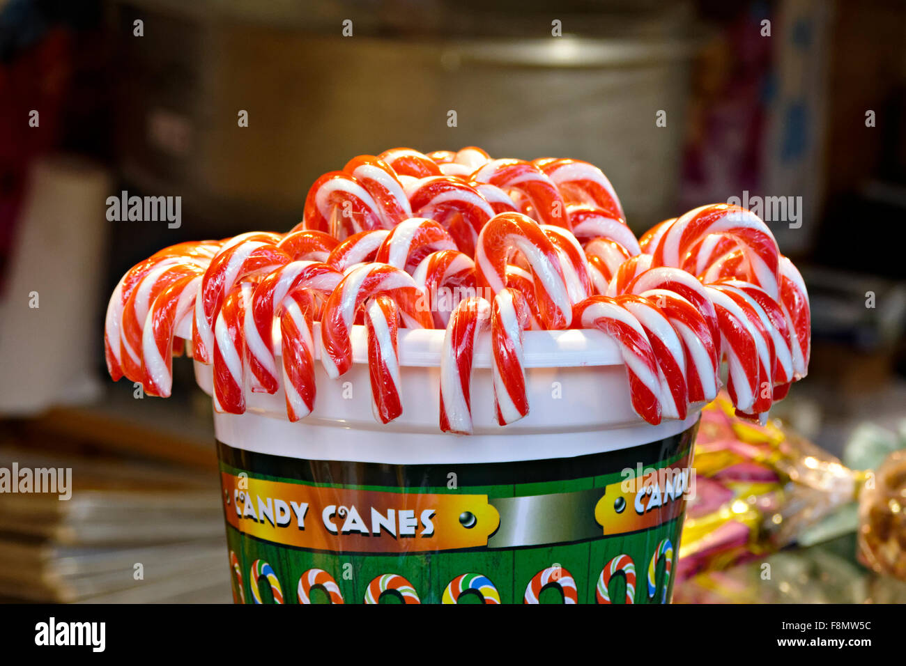 Red and White Candy Canes in a plastic container, Germany, Europe Stock