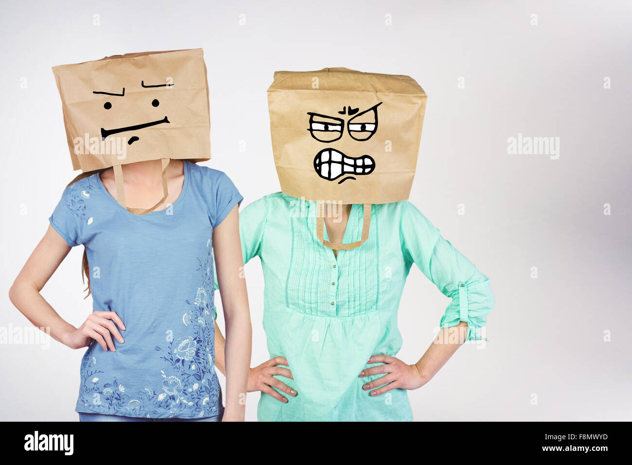 Composite image of woman posing with bag on head Stock Photo Alamy