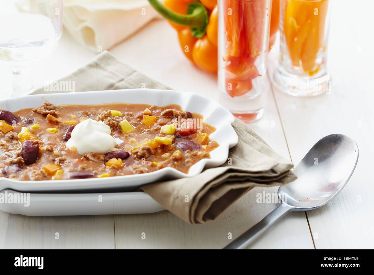 Chilli con carne with sweetcorn and sour cream Stock Photo Alamy