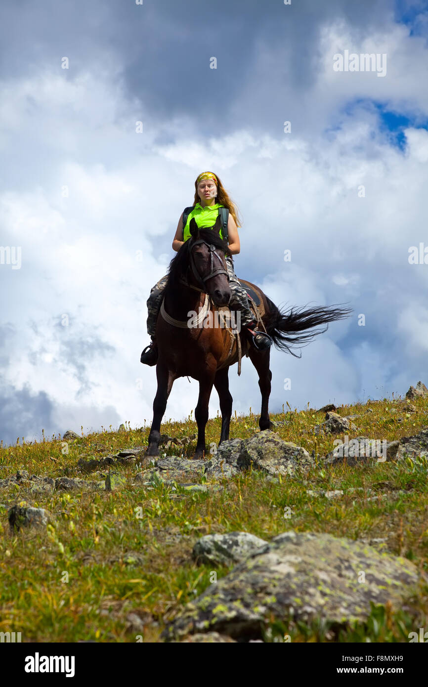 Lone girl riding horse hires stock photography and images Alamy