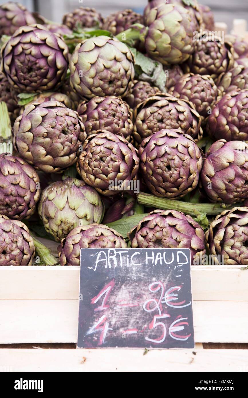 Artichokes at the market with price label Stock Photo Alamy