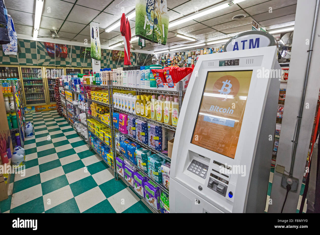 Detroit, Michigan - A Bitcoin ATM next to diapers and shampoo at Timmy's Market, a corner convenience store. Stock Photo