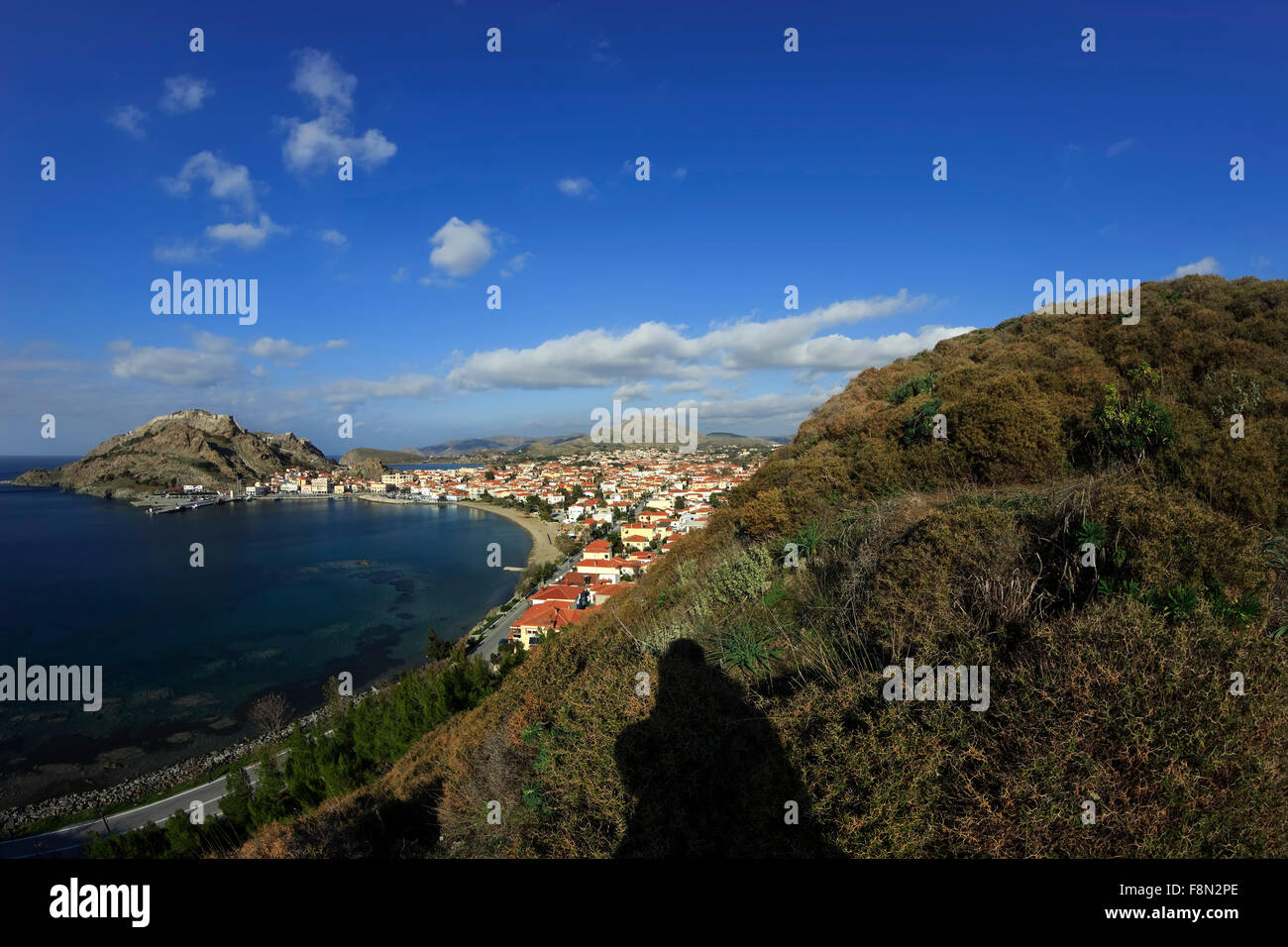 Wide angle view of Myrina city bay and sp. Sarcopoterium spinosum bushes on hillside. Lemnos or Limnos island, Greece Stock Photo