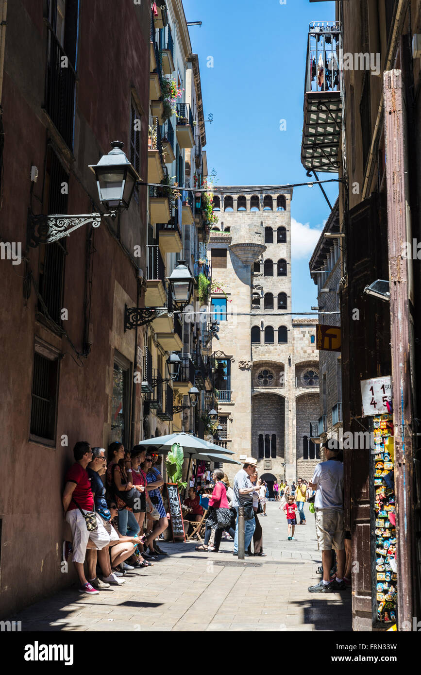 Street of the Gothic Quarter, full of strolling tourists, souvenir shops, and restaurants in Barcelona, Catalonia, Spain Stock Photo