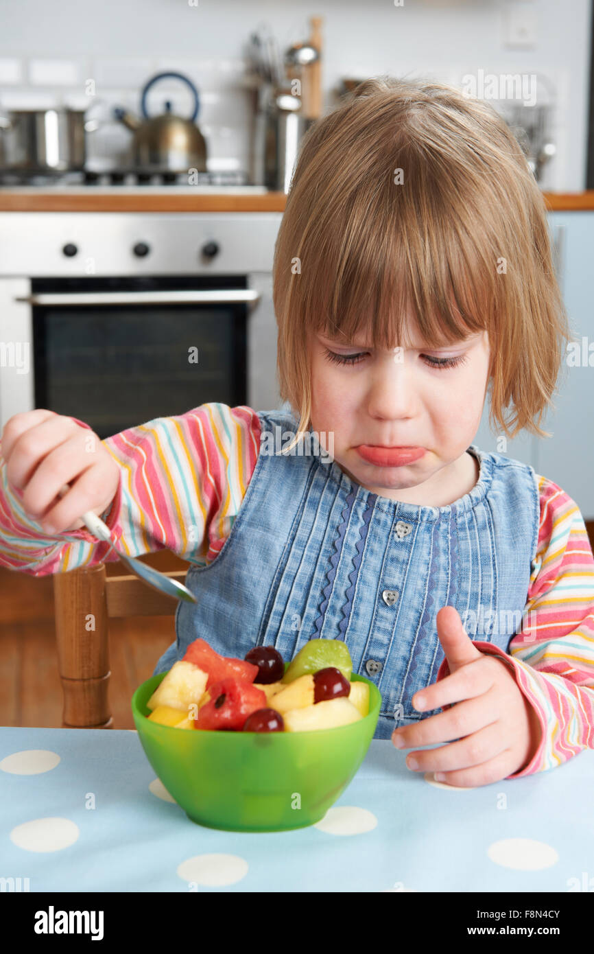 Fussy Child Rejecting Delicious Fruit Salad Pudding Stock Photo Alamy