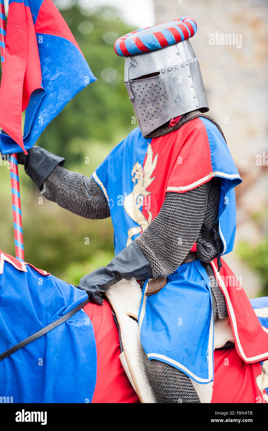 Medieval knight on a horse with flag Stock Photo - Alamy