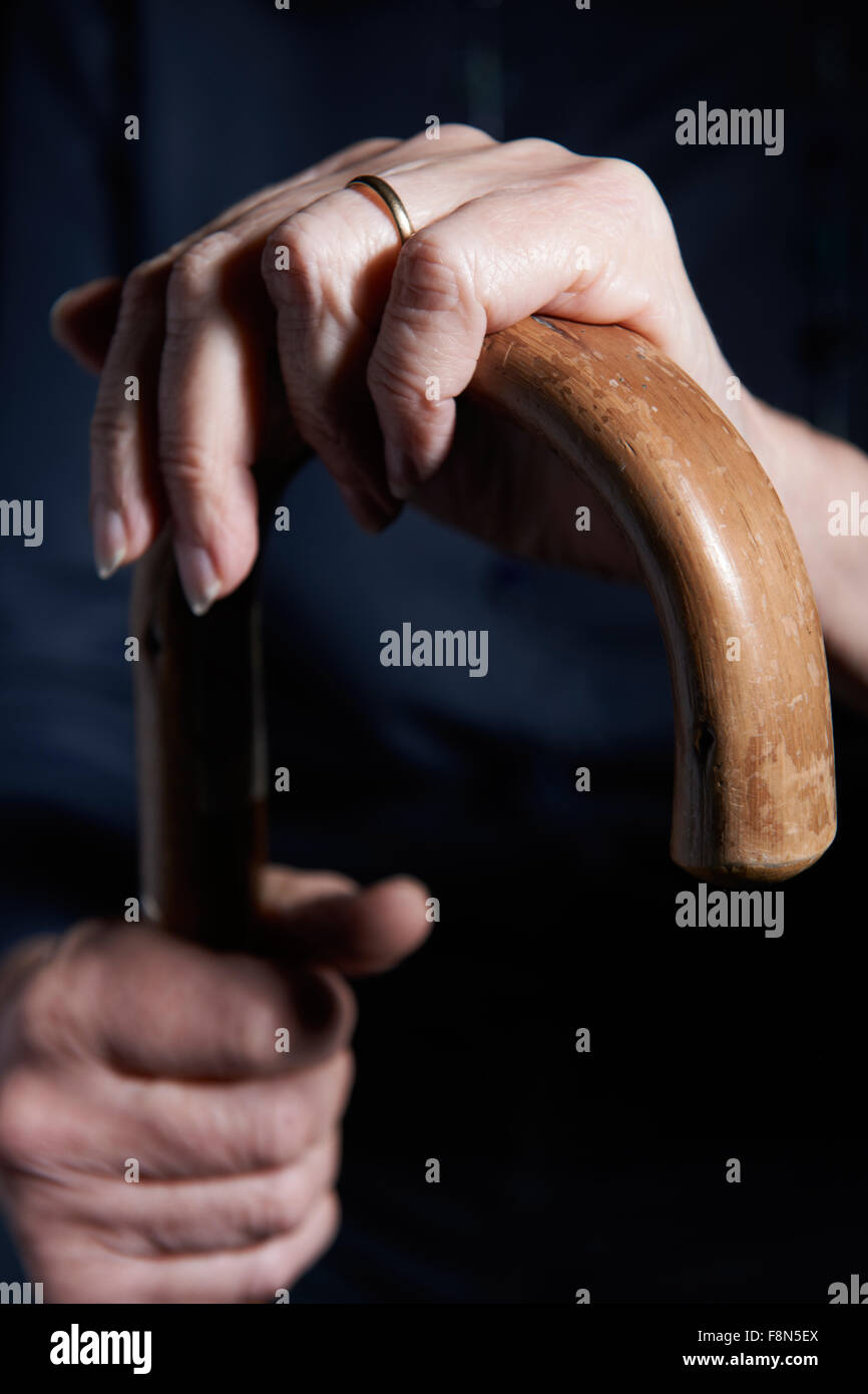 Old woman walking stick on hi-res stock photography and images - Alamy