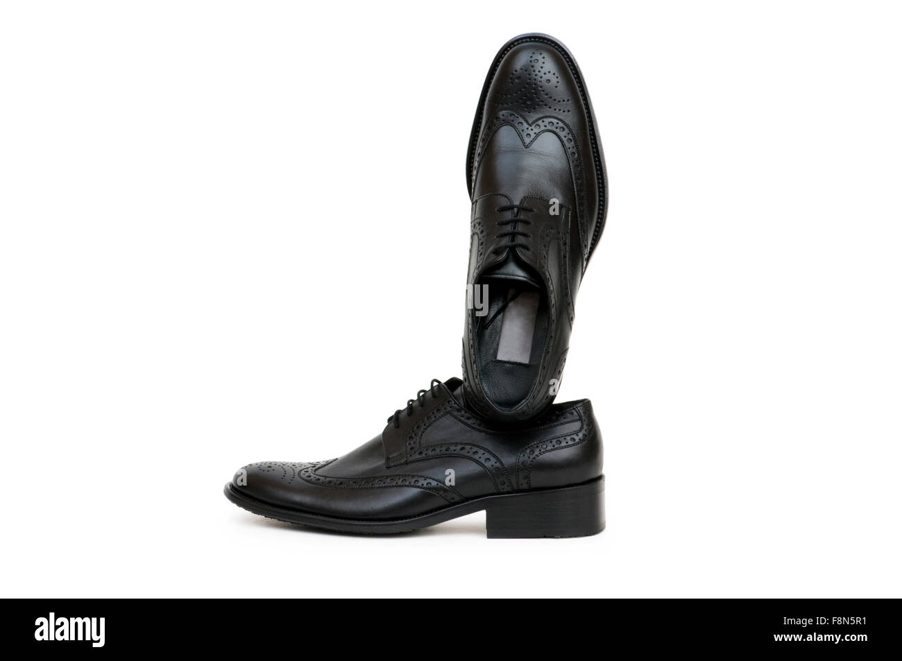 Black shoes isolated on the white background Stock Photo - Alamy