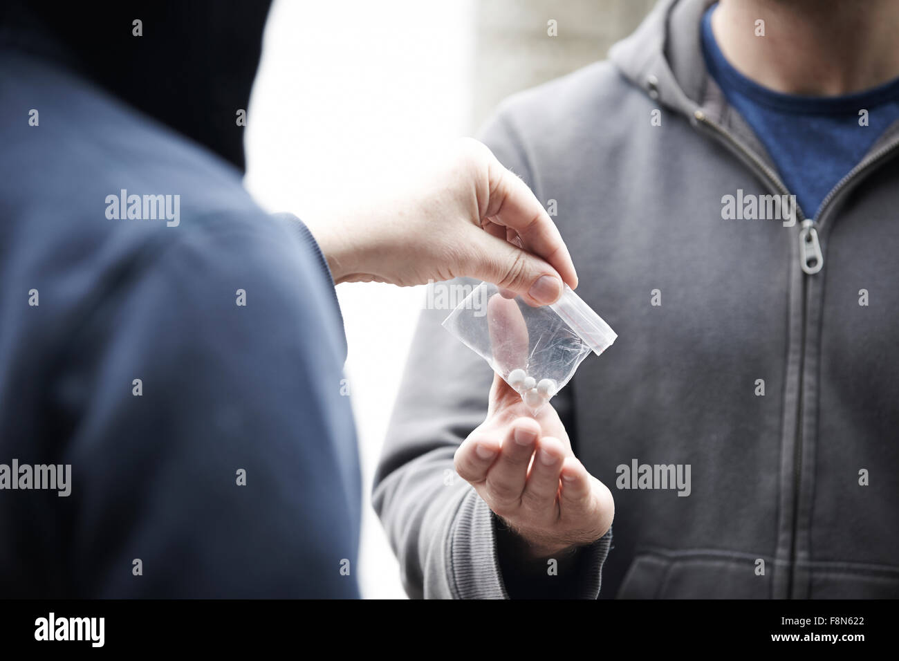 Man Buying Drugs On Street Stock Photo